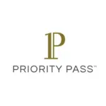 Priority Pass Airport Lounge digital card being scanned for a traveler entering a spacious, modern airport lounge