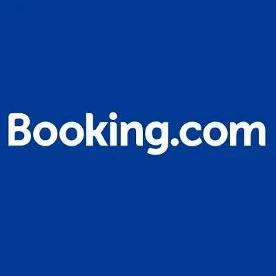 Booking.com Hotels app showing Genius loyalty program benefits and a wide selection of properties worldwide